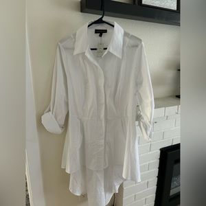 Lane Bryant white collared button front blouse with tags. Never worn.